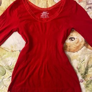 Red long sleeve top with frills